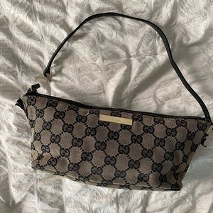 Gucci GG Canvas Boat Purse